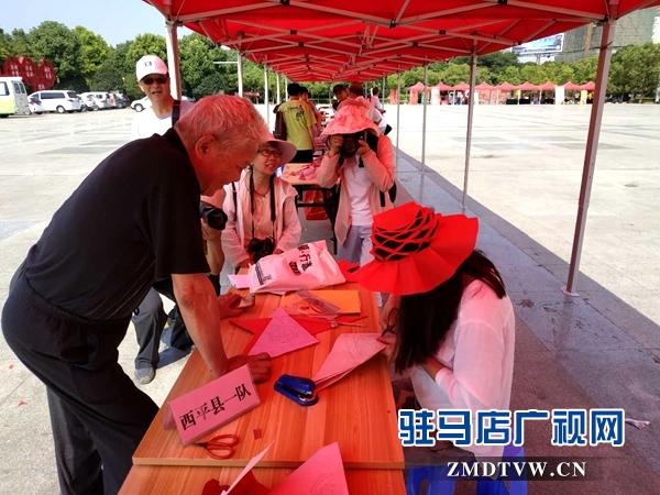 驻马店举行“天中书会”和“多彩非遗”剪纸大赛