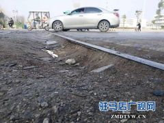 道路长期坑洼不平 市民过往“步步惊心”
