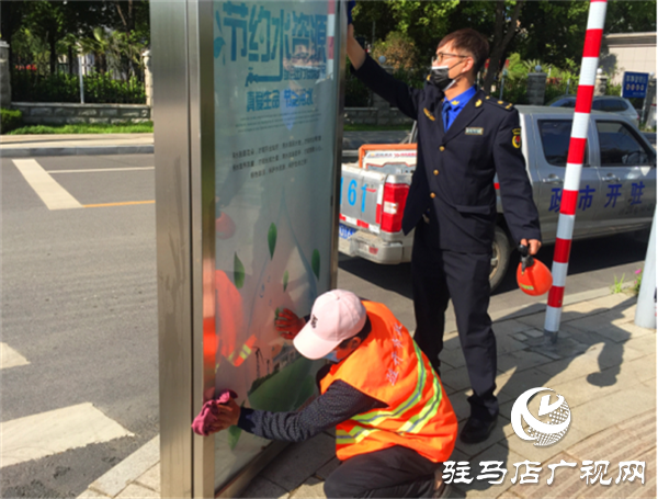 河南驻马店开发区城管局：人民城管为人民   城市清洗靓家园