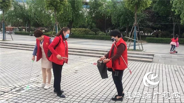 清洁家园 开发区巾帼志愿者在行动