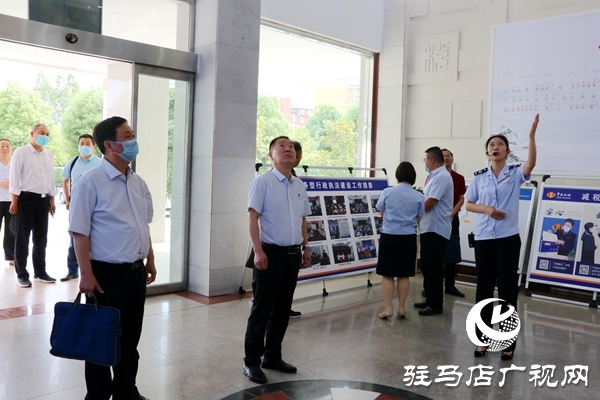 漯河市司法局到确山县交流学习服务型行政执法工作