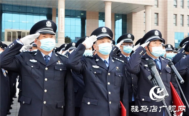 西平县公安局举行庆祝中国人民警察节升旗仪式暨110宣传日活动