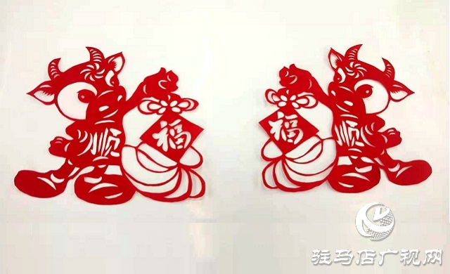 新春剪纸送祝福 居民携手庆佳节