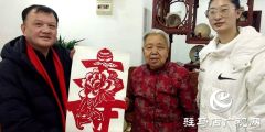 新春剪纸送祝福 居民携手庆佳节