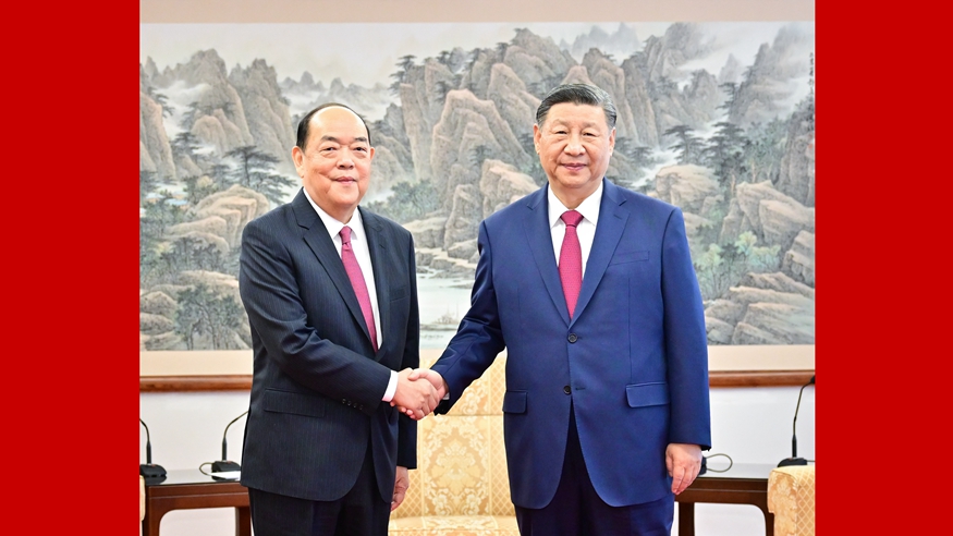 习近平会见贺一诚