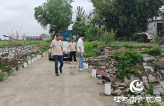 驿城区朱古洞乡：雨中巡查防风险 筑牢防线保民安