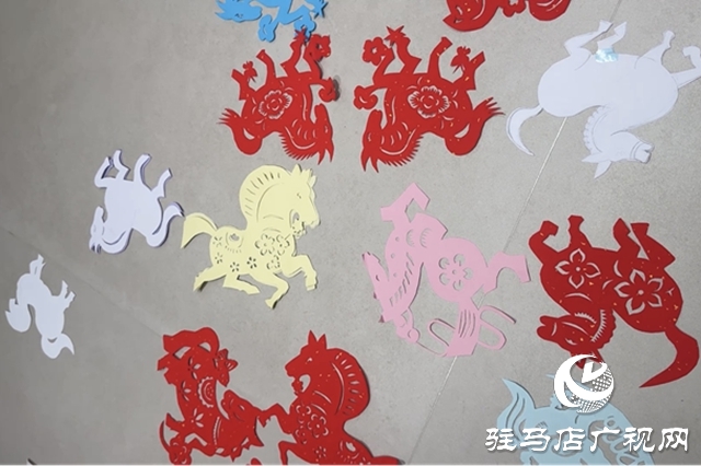 非遗传承人朱俊:剪出龙马精神 守护指尖年俗