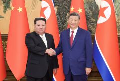 习近平同朝鲜劳动党总书记、国务委员长金正恩举行会谈